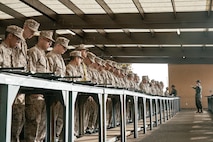 U.S. Marine Corps Drill Instructor, Sgt. Humberto Partida, with India Company, 3rd Recruit Training Battalion, instructs recruits before for a M16A4 service rifle issue at Marine Corps Recruit Depot San Diego, California, Dec. 9, 2024. Recruits will carry their rifles throughout recruit training and will learn how to properly clean and maintain them to help extend the life of the rifles for future recruits. Marines are warfighters first, and always. Every Marine is a rifleman, and Marine officer is a rifle platoon commander. This unique characteristic distinguishes Marines from all Services, at home and abroad. (U.S. Marine Corps photo by Cpl. Sarah M. Grawcock)