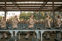 U.S. Marine Corps recruits with India Company, 3rd Recruit Training Battalion, set up for a M16A4 service rifle issue at Marine Corps Recruit Depot San Diego, California, Dec. 9, 2024. Recruits will carry their rifles throughout recruit training and will learn how to properly clean and maintain them to help extend the life of the rifles for future recruits. Marines are warfighters first, and always. Every Marine is a rifleman, and Marine officer is a rifle platoon commander. This unique characteristic distinguishes Marines from all Services, at home and abroad. (U.S. Marine Corps photo by Cpl. Sarah M. Grawcock)