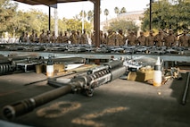 U.S. Marine Corps recruits with India Company, 3rd Recruit Training Battalion, set up for a M16A4 service rifle issue at Marine Corps Recruit Depot San Diego, California, Dec. 9, 2024. Recruits will carry their rifles throughout recruit training and will learn how to properly clean and maintain them to help extend the life of the rifles for future recruits. Marines are warfighters first, and always. Every Marine is a rifleman, and Marine officer is a rifle platoon commander. This unique characteristic distinguishes Marines from all Services, at home and abroad. (U.S. Marine Corps photo by Cpl. Sarah M. Grawcock)
