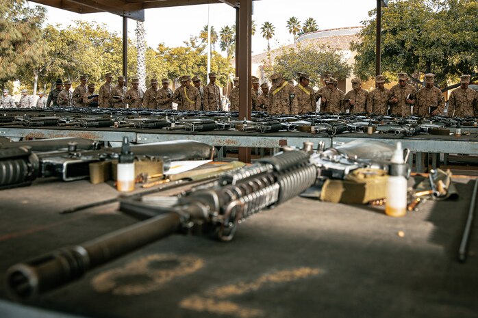 U.S. Marine Corps recruits with India Company, 3rd Recruit Training Battalion, set up for a M16A4 service rifle issue at Marine Corps Recruit Depot San Diego, California, Dec. 9, 2024. Recruits will carry their rifles throughout recruit training and will learn how to properly clean and maintain them to help extend the life of the rifles for future recruits. Marines are warfighters first, and always. Every Marine is a rifleman, and Marine officer is a rifle platoon commander. This unique characteristic distinguishes Marines from all Services, at home and abroad. (U.S. Marine Corps photo by Cpl. Sarah M. Grawcock)