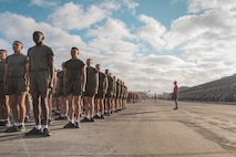 U.S. Marines with Charlie Company, 1st Recruit Training Battalion, stand in formation prior to the company motivational run at Marine Corps Recruit Depot San Diego, California, Dec. 12, 2024. The company motivational run is a three-mile cadence run conducted around the Depot, the last physical training event the Marines will conduct before they graduate from MCRD San Diego and the first time their friends and families will see their newly transformed U.S. Marines. (U.S. Marine Corps photo by Cpl. Alexandra M. Earl)