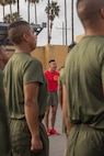 U.S. Marine Corps Drill Instructor Sgt. Shuri Manning, with Charlie Company, 1st Recruit Training Battalion, gives a command to the new Marines after the company motivational run at Marine Corps Recruit Depot San Diego, California, Dec. 12, 2024. The company motivational run is a three-mile cadence run conducted around the Depot, the last physical training event the Marines will conduct before they graduate from MCRD San Diego and the first time their friends and families will see their newly transformed U.S. Marines. (U.S. Marine Corps photo by Cpl. Alexandra M. Earl)