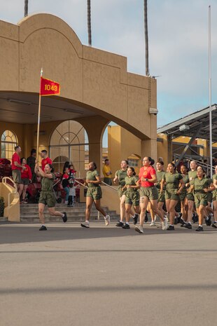 U.S. Marines with Charlie Company, 1st Recruit Training Battalion, participate in the company motivational run at Marine Corps Recruit Depot San Diego, California, Dec. 12, 2024. The company motivational run is a three-mile cadence run conducted around the Depot, the last physical training event the Marines will conduct before they graduate from MCRD San Diego and the first time their friends and families will see their newly transformed U.S. Marines. (U.S. Marine Corps photo by Cpl. Alexandra M. Earl)
