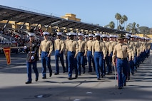 U.S. Marines with Charlie Company, 1st Recruit Training Battalion, march in formation during a graduation ceremony at Marine Corps Recruit Depot San Diego, California, Dec. 13, 2024. Graduation took place at the completion of the 13-week transformation, which included training for drill, marksmanship, basic combat skills, and Marine Corps customs and traditions. (U.S. Marine Corps photo by Lance Cpl. Jacob B. Hutchinson)