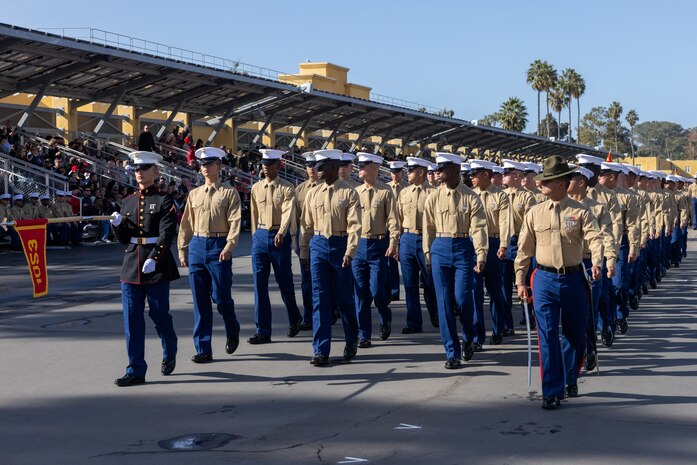 U.S. Marines with Charlie Company, 1st Recruit Training Battalion, march in formation during a graduation ceremony at Marine Corps Recruit Depot San Diego, California, Dec. 13, 2024. Graduation took place at the completion of the 13-week transformation, which included training for drill, marksmanship, basic combat skills, and Marine Corps customs and traditions. (U.S. Marine Corps photo by Lance Cpl. Jacob B. Hutchinson)