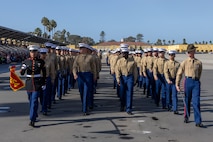 U.S. Marines with Charlie Company, 1st Recruit Training Battalion, march in formation during a graduation ceremony at Marine Corps Recruit Depot San Diego, California, Dec. 13, 2024. Graduation took place at the completion of the 13-week transformation, which included training for drill, marksmanship, basic combat skills, and Marine Corps customs and traditions. (U.S. Marine Corps photo by Lance Cpl. Jacob B. Hutchinson)