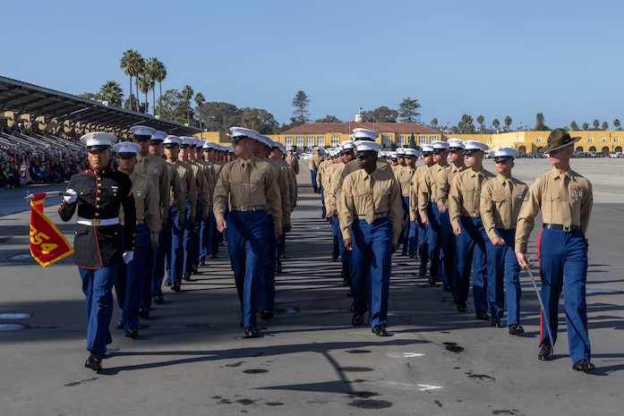 U.S. Marines with Charlie Company, 1st Recruit Training Battalion, march in formation during a graduation ceremony at Marine Corps Recruit Depot San Diego, California, Dec. 13, 2024. Graduation took place at the completion of the 13-week transformation, which included training for drill, marksmanship, basic combat skills, and Marine Corps customs and traditions. (U.S. Marine Corps photo by Lance Cpl. Jacob B. Hutchinson)