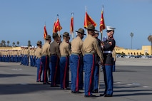U.S. Marine Corps drill instructors with Charlie Company, 1st Recruit Training Battalion, prepare to retire the guidons as a part of a graduation ceremony at Marine Corps Recruit Depot San Diego, California, Dec. 13, 2024. Graduation took place at the completion of the 13-week transformation, which included training for drill, marksmanship, basic combat skills, and Marine Corps customs and traditions. (U.S. Marine Corps photo by Lance Cpl. Jacob B. Hutchinson)