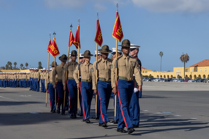 U.S. Marine Corps drill instructors with Charlie Company, 1st Recruit Training Battalion, retire the guidons as a part of a graduation ceremony at Marine Corps Recruit Depot San Diego, California, Dec. 13, 2024. Graduation took place at the completion of the 13-week transformation, which included training for drill, marksmanship, basic combat skills, and Marine Corps customs and traditions. (U.S. Marine Corps photo by Lance Cpl. Jacob B. Hutchinson)