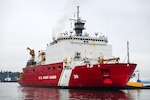 Coast Guard Cutter Healy (WAGB 20), a 420-foot polar icebreaker, returns home to Seattle after spending more than five months at sea Dec. 12, 2024. During the patrol, the crew aboard the Healy conducted several missions to further scientific knowledge and the discovery of a volcano-like feature in the Arctic seabed, suggesting previously unknown geological activity. (U.S. Coast Guard photo by Petty Officer 3rd Class Annika Hirschler)
