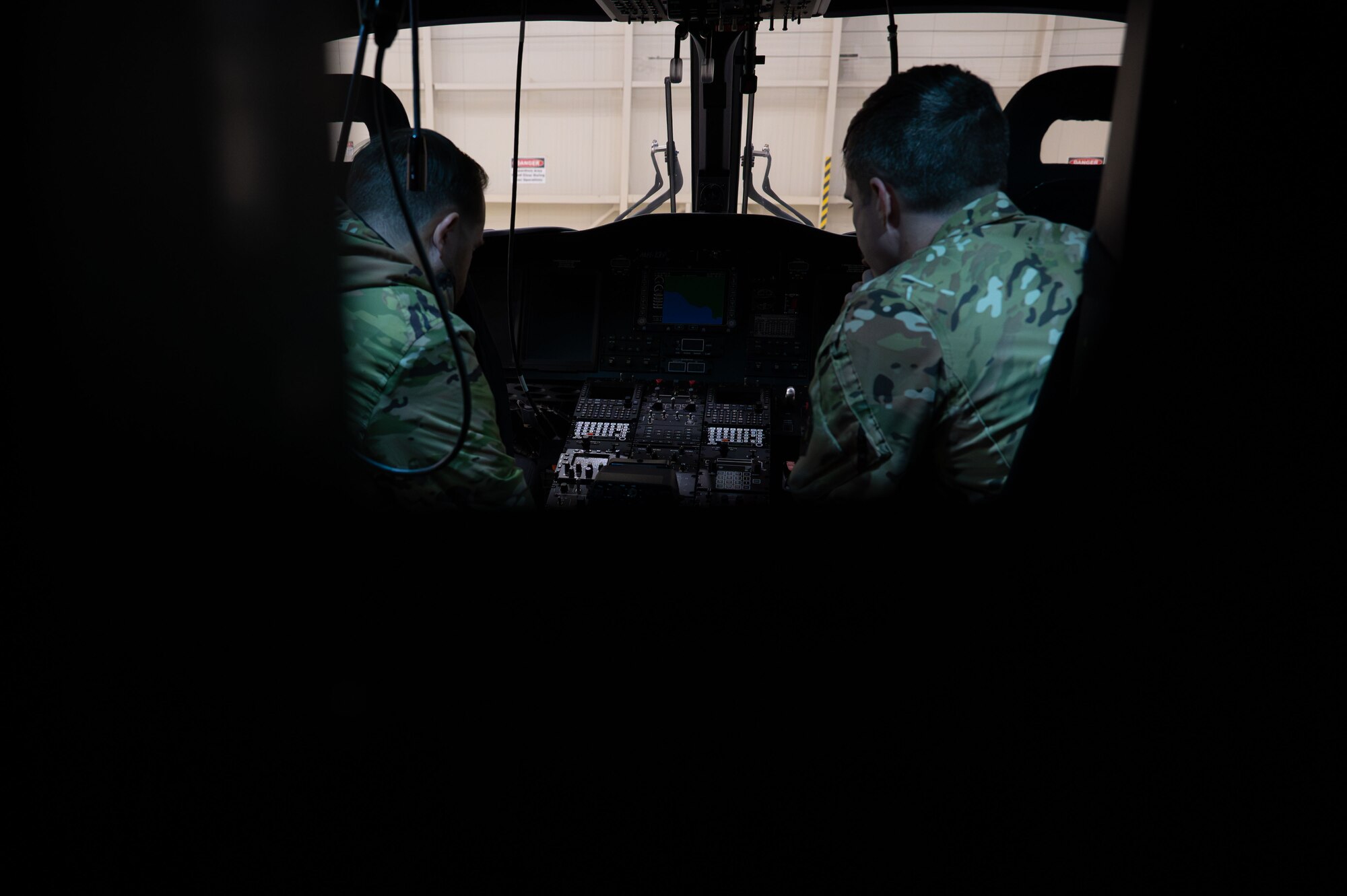 people inspect a flight deck