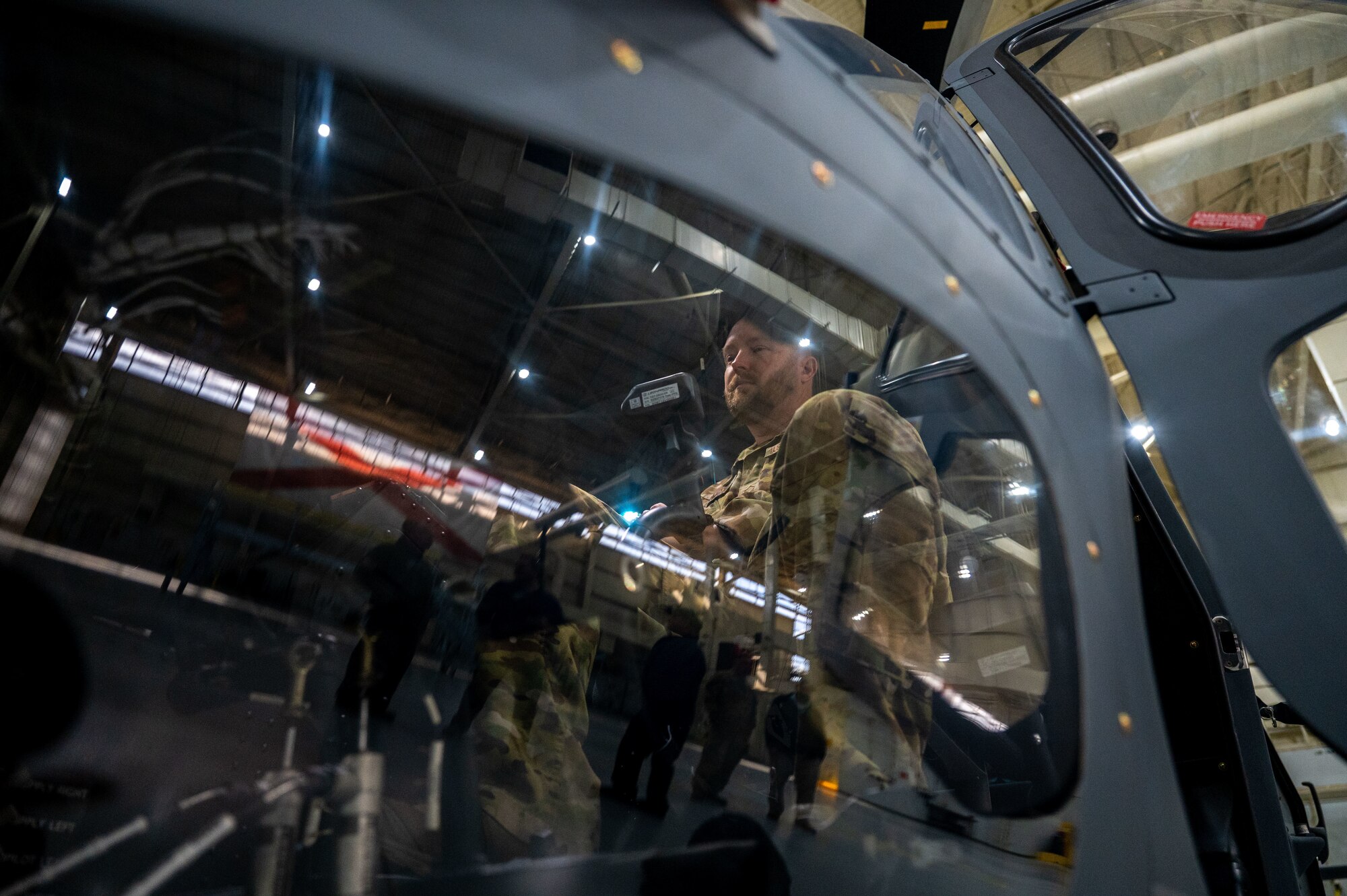 a man sit on a flight deck