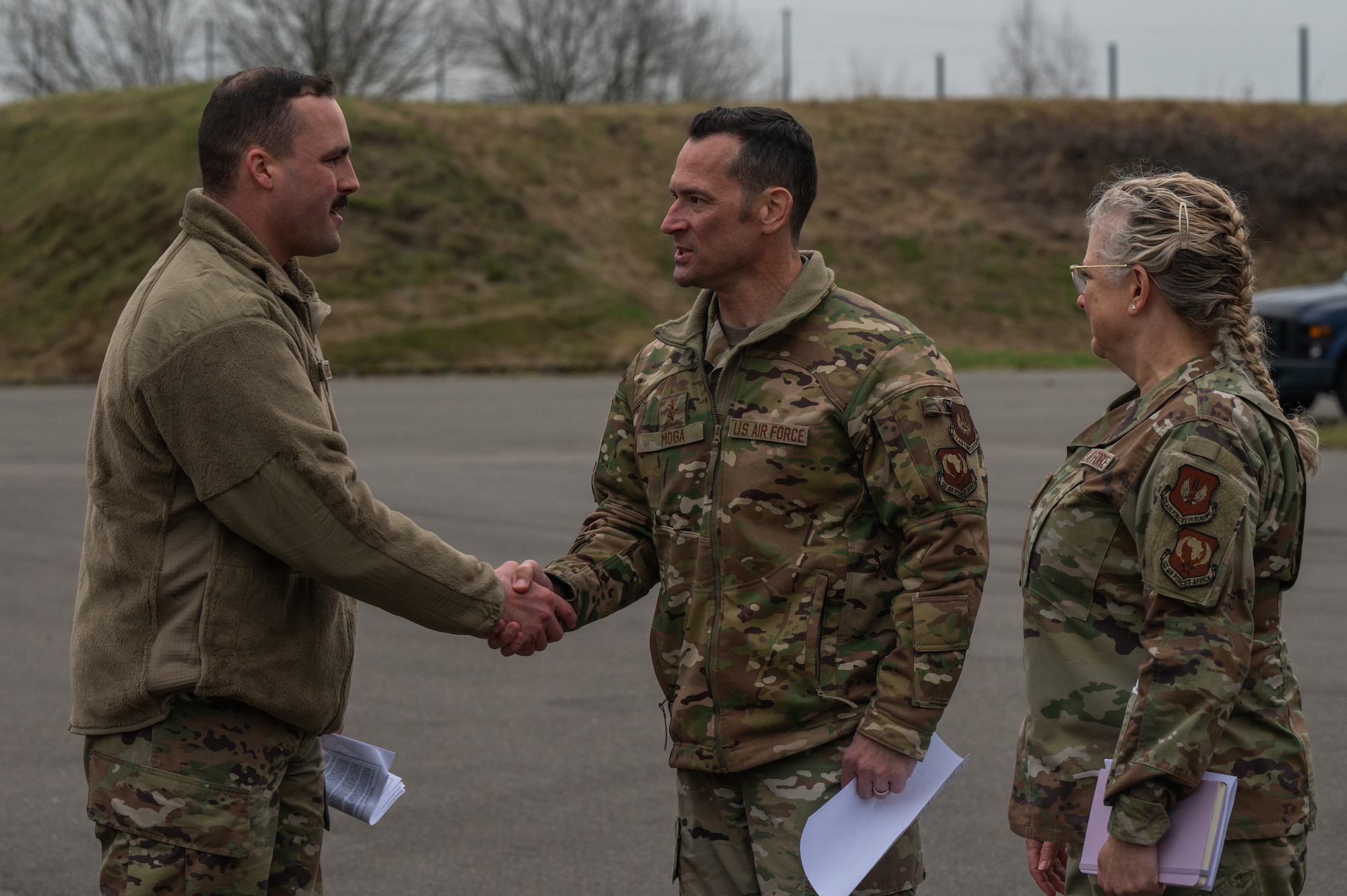 A man shakes hands with another man