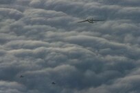 Swedish Air Force Saab JAS 39 Gripens escort a U.S. Air Force B-52H Stratofortress assigned to the 20th Expeditionary Bomb Squadron over Europe during a Bomber Task Force 25-1 mission, Nov. 25, 2024. The U.S. frequently trains alongside NATO Allies to maintain readiness and interoperability in the Baltic Sea region.(U.S. Air Force photo by Staff Sgt. Emily Farnsworth)