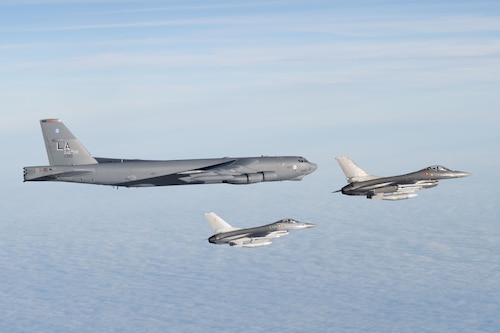 A U.S. Air Force B-52H Stratofortress assigned to the 20th Expeditionary Bomb Squadron is escorted by two Royal Danish Air Force F-16 Fighting Falcons above the Baltic Sea during Bomber Task Force 25-1, Nov. 15, 2024. We are stronger together. BTF 25-1 is a part of a long-term multinational training plan to maintain readiness and interoperability between NATO Allies and partner nations in the Baltic Sea region. (U.S. Air Force photo by Senior Airman Jacob Cabanero)