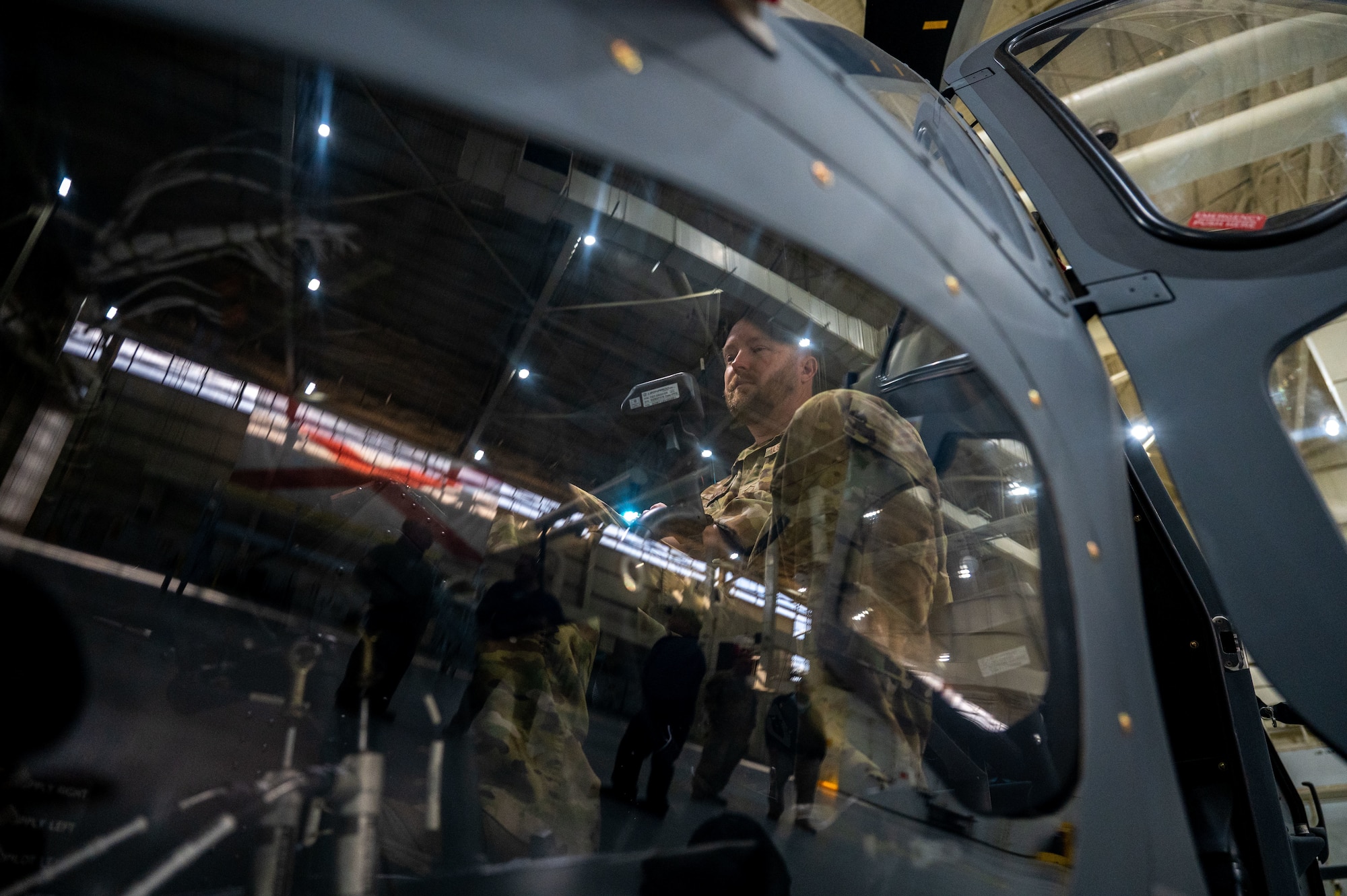 a man sit on a flight deck