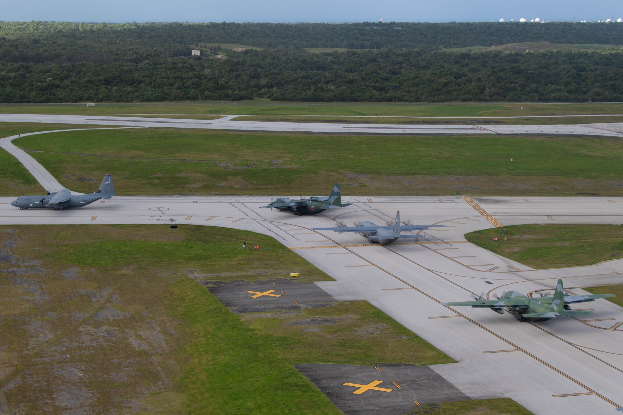 Four planes roll into position.