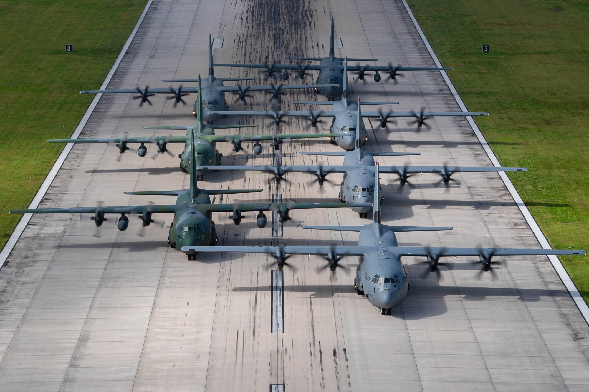 Seven planes sit in formation.