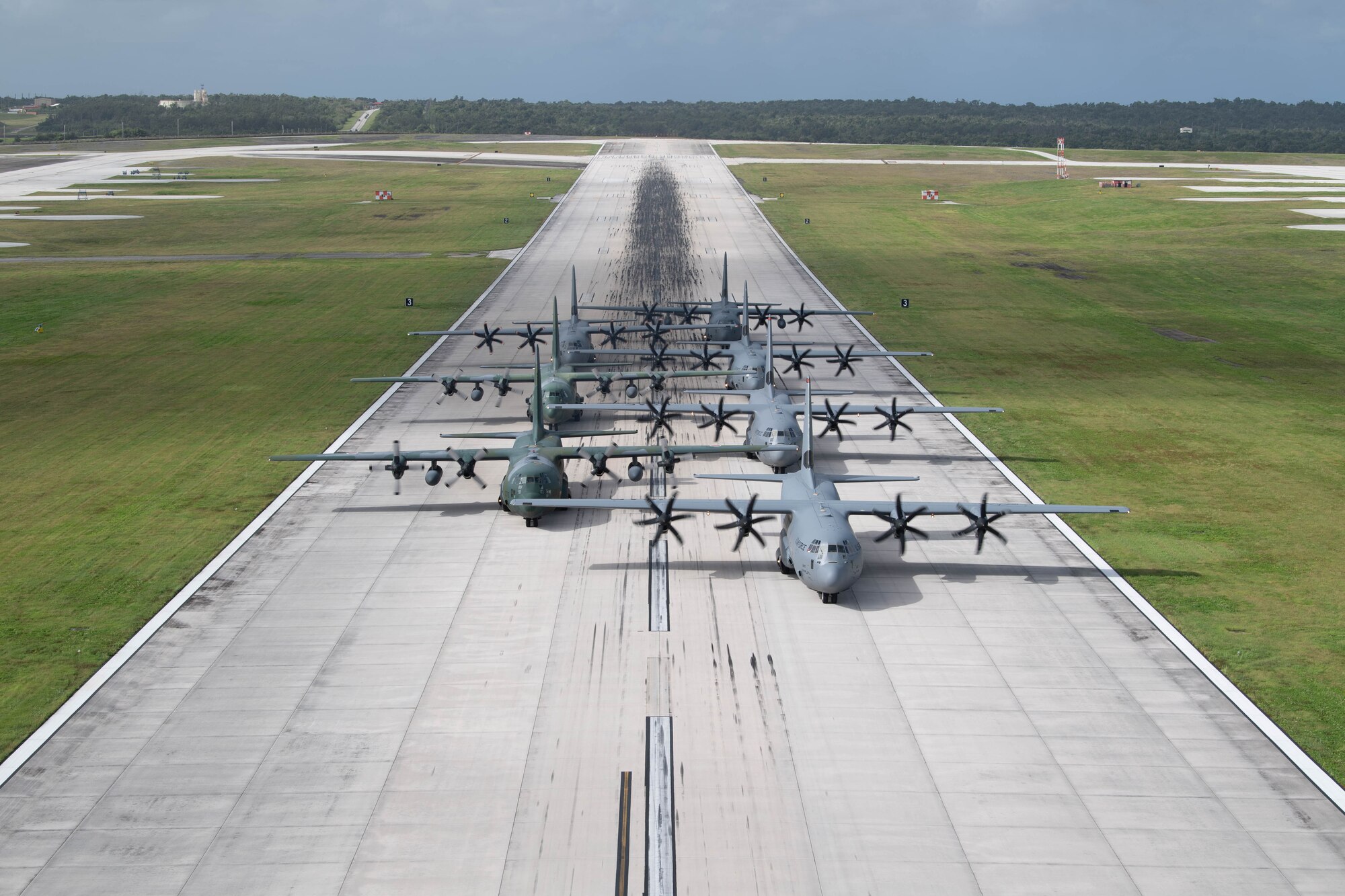 Seven planes sit in formation.