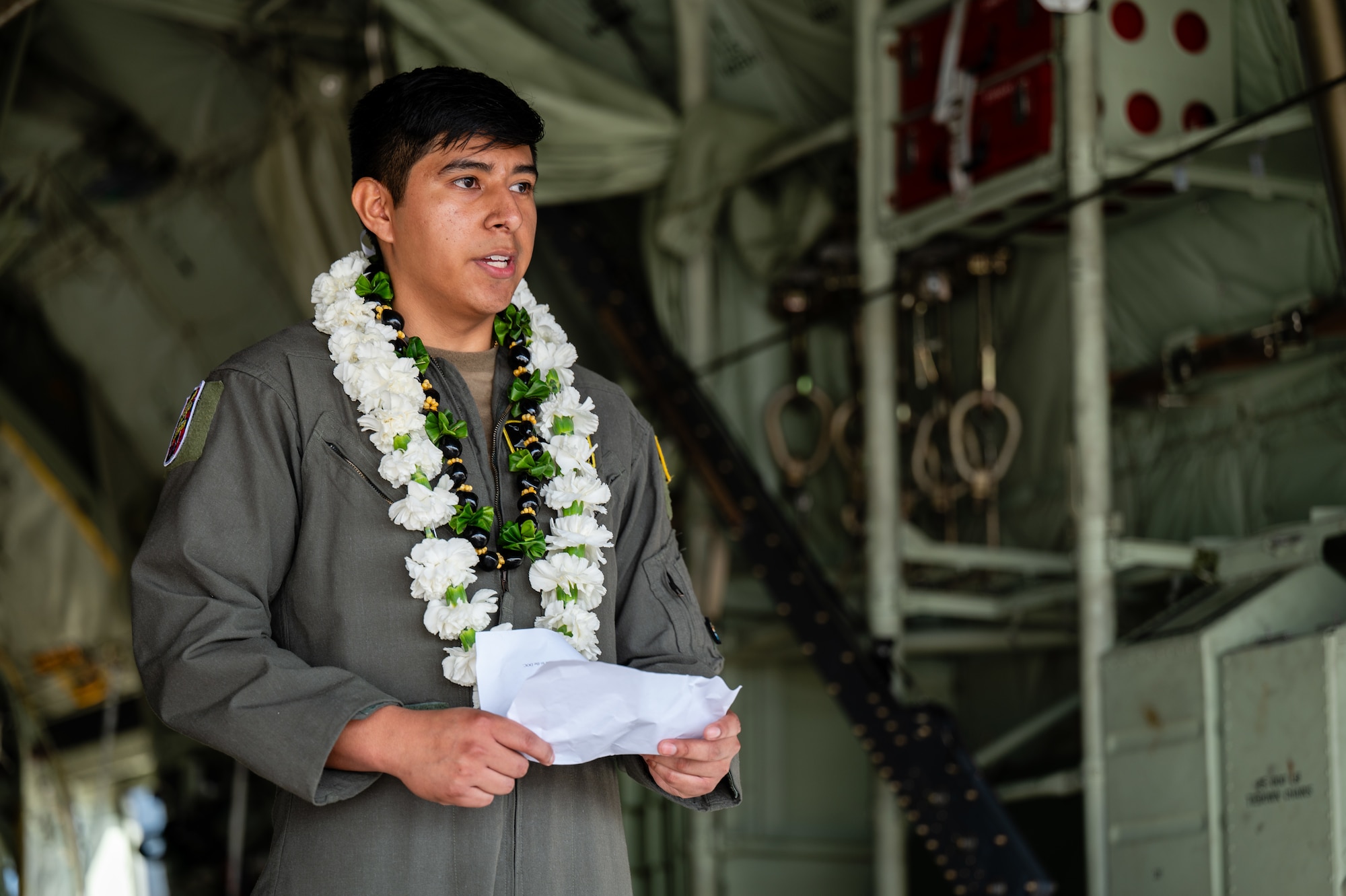 Airmen, family members, and international partners gathered at Andersen Air Force Base, Guam, December 12, 2024, to honor U.S. Air Force Senior Airman Jeremy Jutba-Hake, who passed away in 2015 while supporting Operation Christmas Drop. A commemorative aid bundle signed by attendees was later delivered to remote Pacific islands as part of the annual humanitarian mission.