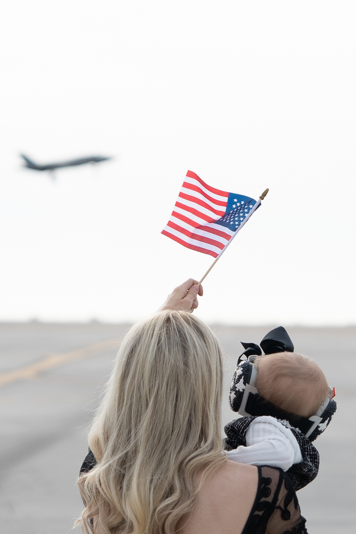 Family and friends gather to welcome home U.S. Marines with Marine Fighter Attack Squadron (VMFA) 314, Marine Aircraft Group 11, 3rd Marine Aircraft Wing, at Marine Corps Air Station Miramar, California, Dec. 14, 2024. VMFA-314 completed a five-month deployment aboard the USS Abraham Lincoln (CVN-72) to the U.S. Fifth and Seventh Fleet areas of operation, conducting combat and joint operations in support of U.S. Central Command objectives and enhancing interoperability with allied nations. VMFA-314’s deployment marked the first combat employment of the F-35C Lightning II, demonstrating its capabilities in operational scenarios and setting a new standard for future naval aviation operations. (U.S. Marine Corps photo by Sgt. Daniel Childs)