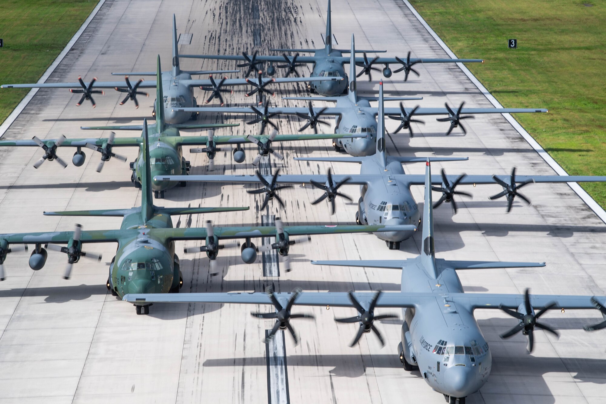 Seven planes sit in formation.