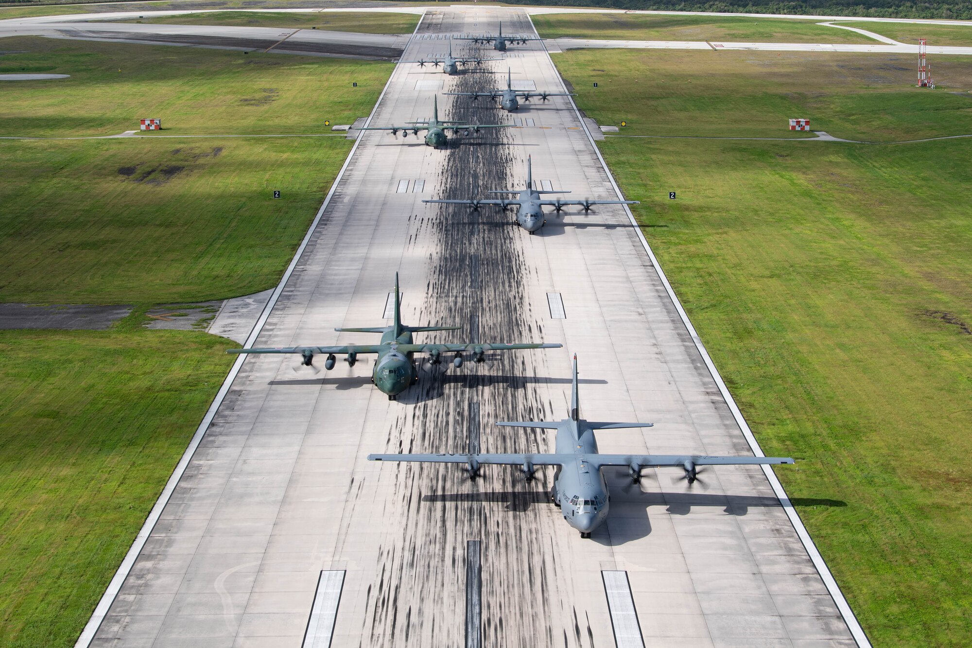 Seven planes move into formation.