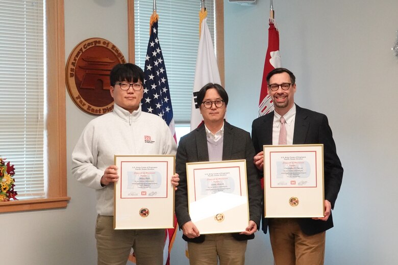 Sang Na, Civil Engineer, U.S. Army Corps of Engineers – Far East District, accepts Minjae “MJ” Park’s certificate on his behalf; while Seung Ji, Deputy Chief of Construction; and Christopher Carson, project manager, accepts their completion certifications at the USACE Leadership Development Program (ULDP) Level 3 graduation held Dec. 5, 2024, at Camp Humphreys, South Korea. ULDP’s aim is to cultivate leadership at every level within USACE to benefit the organizations and beyond. (U.S. Army photo by Kyong Il Yo)