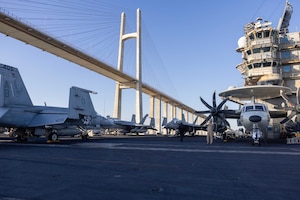 ) The Nimitz-class aircraft carrier USS Harry S. Truman (CVN 75) transits the Suez Canal, Dec. 15.