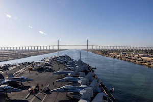 ) The Nimitz-class aircraft carrier USS Harry S. Truman (CVN 75) transits the Suez Canal, Dec. 15.