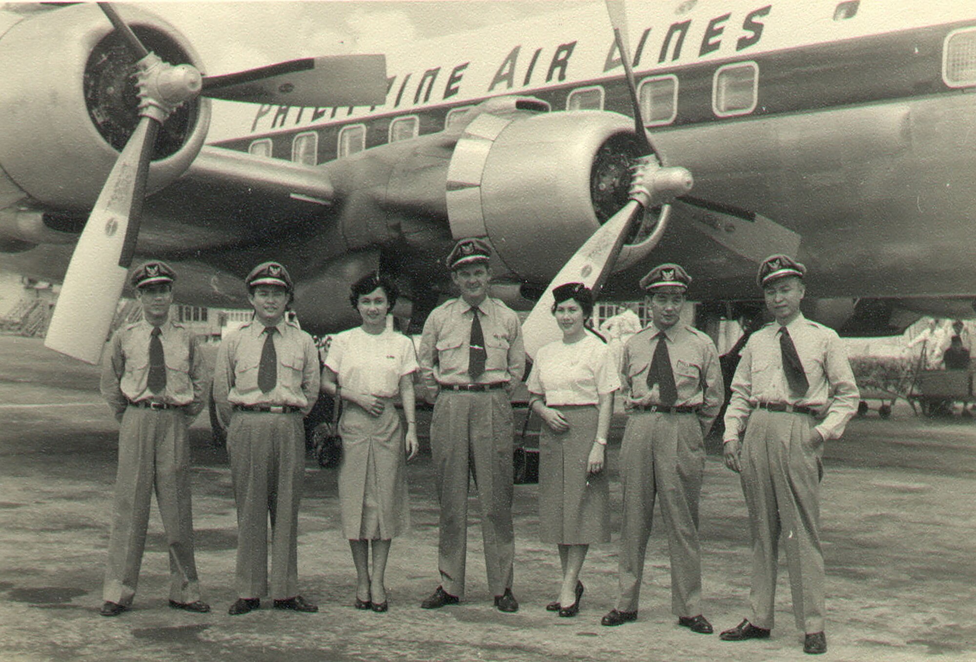 Charlie Wilson, center, poses for a photo with his Philippine Airlines crew in 1946. He retired from the U.S. Army Air Corps as a captain assigned to the 100th Bomb Group at Thorpe Abbots, Norfolk, England, during World War II. Wilson was a B-17 Flying Fortress pilot who started his flying career with the Royal Canadian Air Force as a sergeant-pilot. (Photo courtesy of Curtis Wilson)