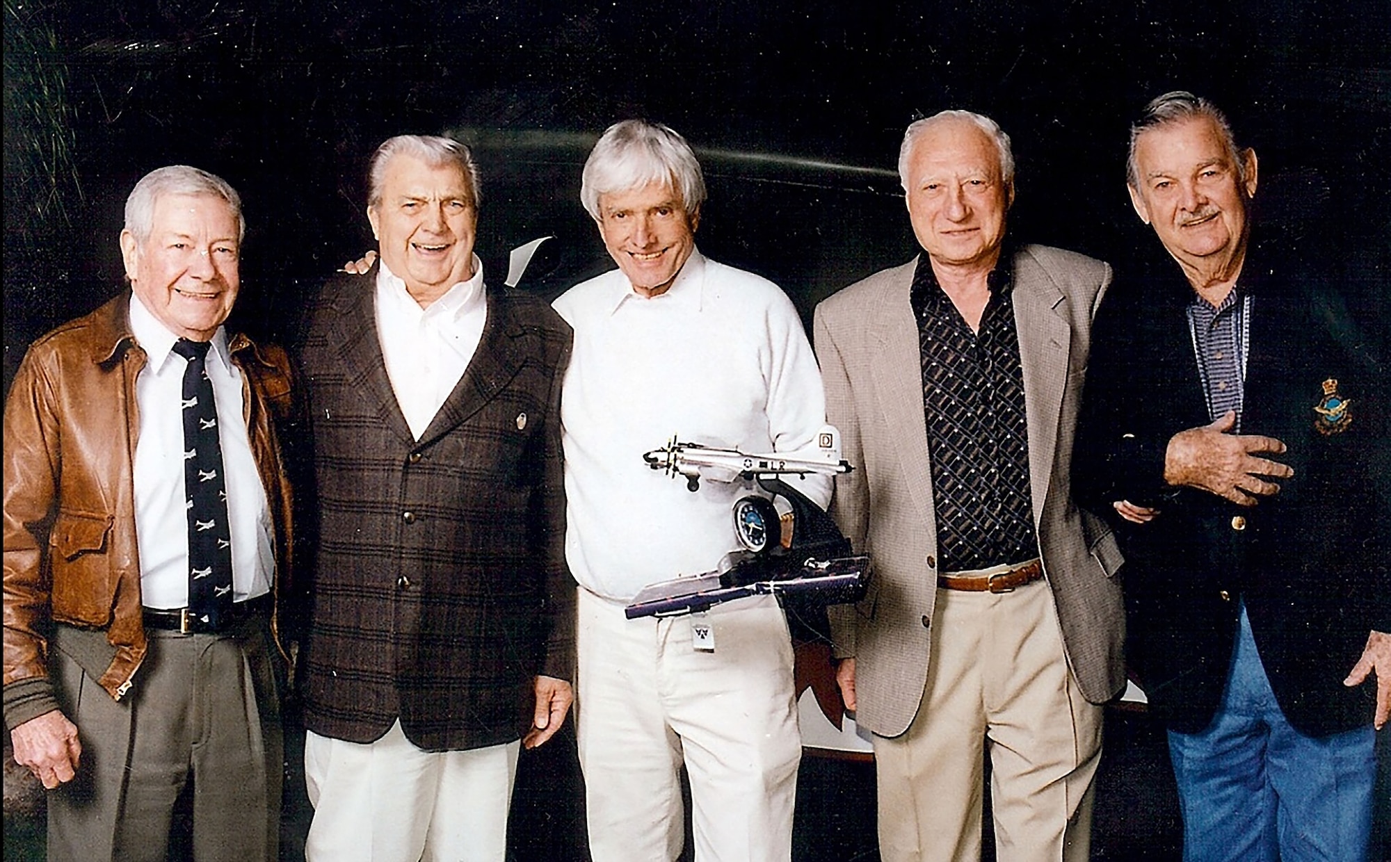 From left to right, U.S. Army Air Corps-retired Gen. Thomas Jeffrey, 100th Bomb Group commanding officer; Tech. Sgt. Rick Erickson, 350th Bomb Squadron B-17 Flying Fortress radio operator gunner; Lt. David Tallichet, 350th BS B-17 co-pilot; Lt. Col. Robert “Rosie” Rosenthal, 418th Bomb Squadron commander and B-17 pilot; and Capt. Charlie “Hong Kong” Wilson, 350th Bomb Squadron B-17 pilot, pose for a group photo in Palm Springs, California, in 2003. Reunions became very important over the years as it provided an opportunity for many 100th BG veterans to reconnect, share stories and introduce families to their history and heritage. (Photo courtesy of Curtis Wilson)