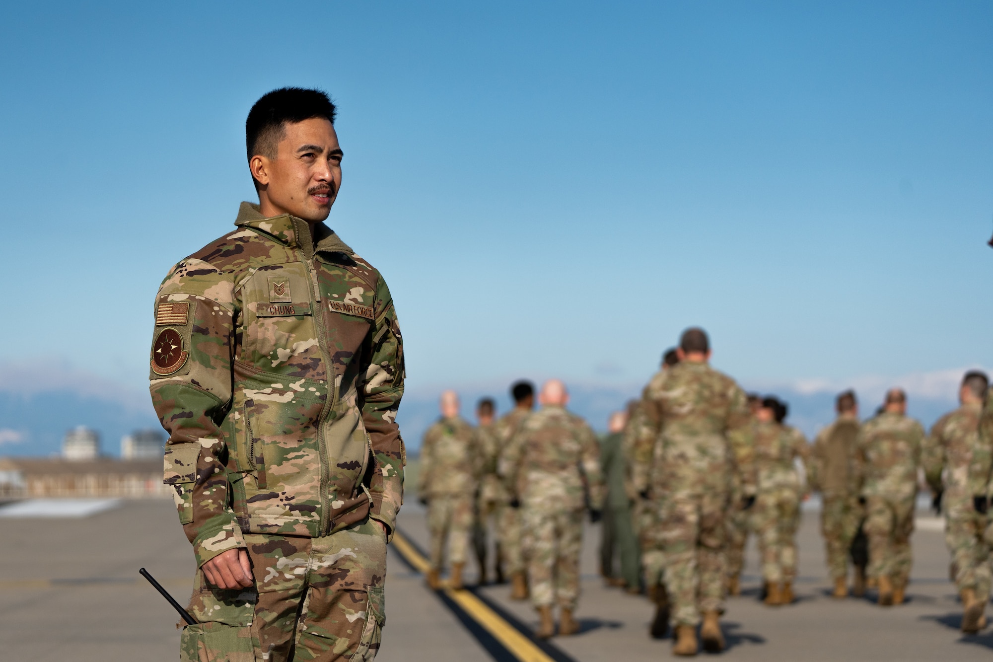 U.S. Air Force Tech. Sgt. Justin Chung, 39th Air Base Wing airfield manager, oversees Airmen of the 39th Air Base Wing during a walk on the flightline to remove foreign object debris at Incirlik Air Base, Türkiye, Dec. 13, 2024. FOD walks help to facilitate the safe operation of aircraft in and out of the airfield, protecting lives and equipment. (U.S. Air Force Tech. Sgt. Dhruv Gopinath)