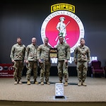The Nebraska National Guard, shown Dec. 12, 2024, won the 54th WPW Sniper Championship and Chief David R. Logan Sniper Team Trophy is the Nebraska National Guard. The WPW Sniper Championship, held at Fort Chaffee, Ark., and hosted by the National Guard Marksmanship Training Center, brought together elite marksmen to compete in precision shooting and tactical decision-making, honoring the storied legacy of military sniper excellence.