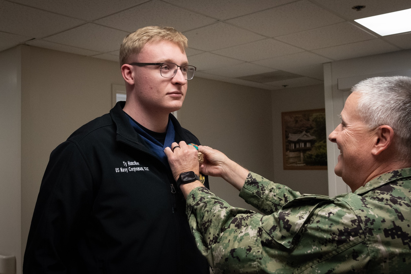 Hospital Corpsman Third Class Ty Hunziker receives the Navy and Marine Corps Achievement Medal for his service aboard Naval Health Clinic Cherry Point from October to December 2024.

Hunziker, who is currently assigned to Naval Hospital Jacksonville, volunteered to serve as a Surgical Technologist in the Cherry Point clinic’s Ambulatory Procedure Unit.  During that, he trained two new Surgical Technicians and completed over 100 surgical cases.