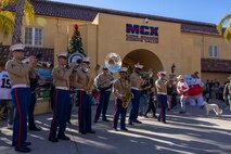 U.S. Marines with Marine Band San Diego play music at the Holiday Express event at Marine Corps Recruit Depot San Diego, California, Dec. 7, 2024. The Holiday Express is an annual event held at the Depot to bring holiday cheer to Marines, civilian employees and their families with crafts, music, opportunity drawings and more. (U.S. Marine Corps photo by Cpl. Alexander O. Devereux)