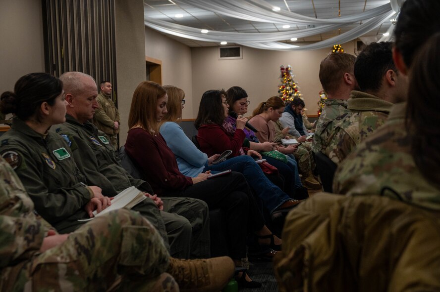 Audience members engage with panelists during a community leader engagement panel at Minot Air Force Base, North Dakota, Dec. 12, 2024. The panel provided an open forum for questions and answers, fostering collaboration and understanding between the base and the Minot community. (U.S. Air Force photo by Airman 1st Class Luis Gomez)Audience members engage with panelists during a community leader engagement panel at Minot Air Force Base, North Dakota, Dec. 12, 2024. The panel provided an open forum for questions and answers, fostering collaboration and understanding between the base and the Minot community. (U.S. Air Force photo by Airman 1st Class Luis Gomez)