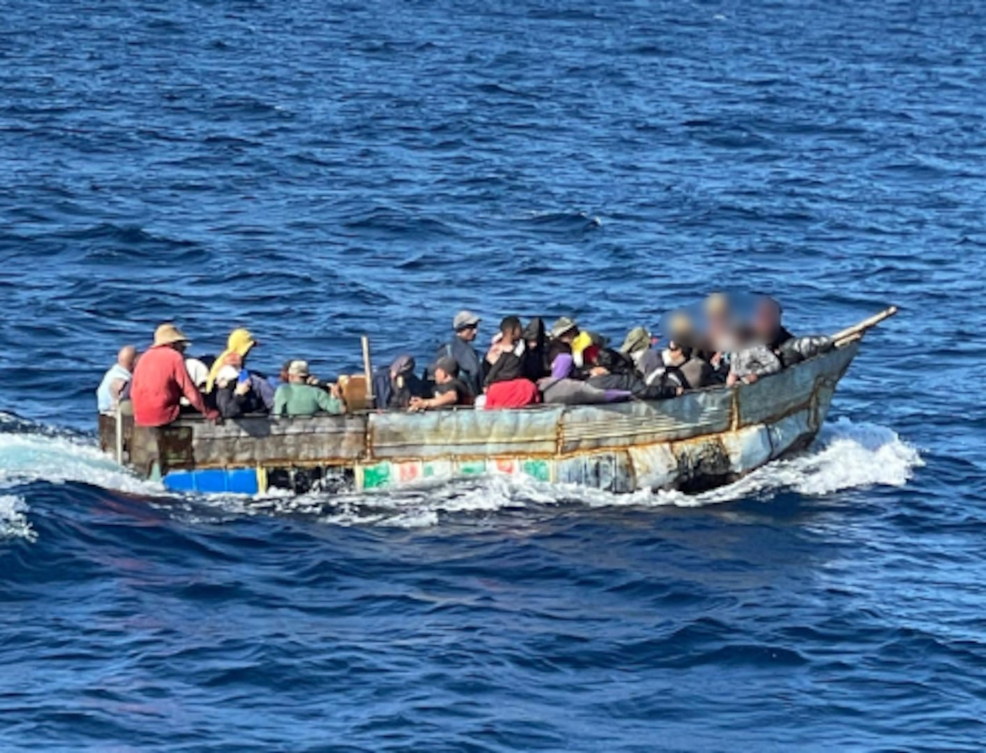 Migrants on board a makeshift vessel south of Marathon. Sector Key West watchstanders diverted the crew of the Coast Guard cutter Paul Clark to interdict. (U.S. Coast Guard photo)