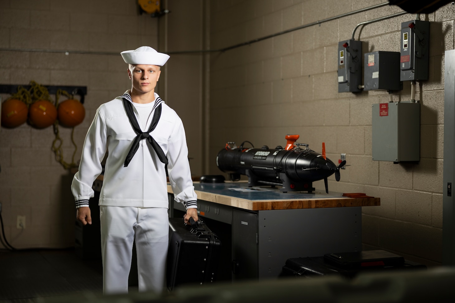 Seaman Isaiah Fye, assigned to the Mine Warfare Training Center (MWTC), a subordinate command of Surface Combat Systems Training Command, poses for a portrait onboard the Naval Base Point Loma Annex in San Diego, California, on Sept. 19, 2024. Fye is currently a student at MWTC, where he is training in mine warfare tactics to support operational readiness in the fleet. (U.S. Navy photo by Austen McClain)