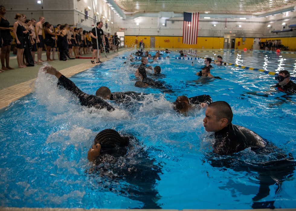 Recruits receive training at the USS Indianapolis Combat Pool at Recruit Training Command.