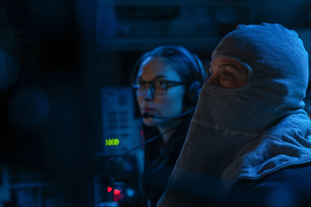 Lt. j.g. Ana Sokolowski uses a console in the combat control room aboard USS William P. Lawrence (DDG 110).