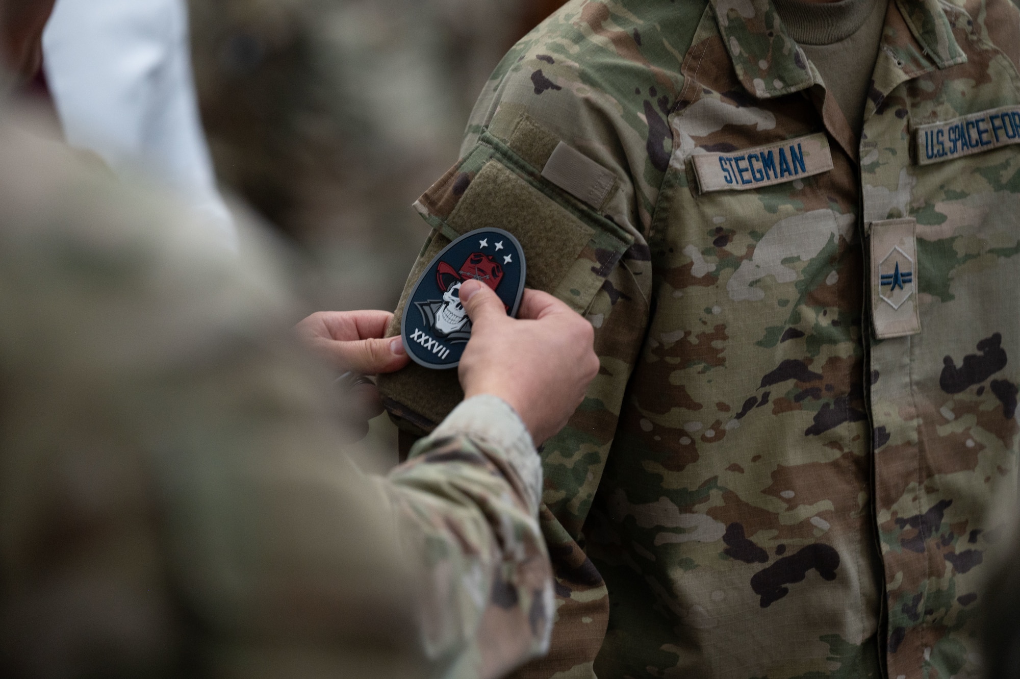 After 13 months as a detachment in provisional status, the 37 Tactical Intelligence Squadron activated Nov. 15 in a ceremony at Peterson Space Force Base, Colorado. Following the ceremony, members lined up for a symbolic patching ceremony recognizing the activation of 37 TIS.