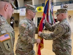 Command Sgt. Maj. Kelly of the 33rd IBCT passed the brigade guidon to Col. Seth Hible, Commander of the 33rd IBCT during a Change of Responsibility Ceremony held Dec. 8.