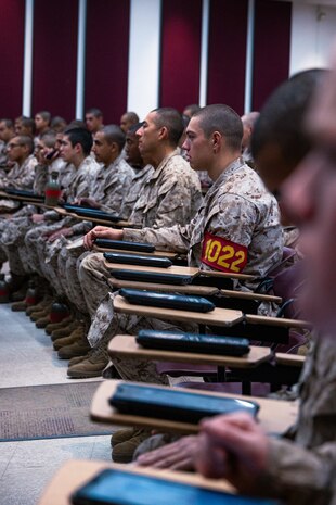 U.S. Marine Corps recruits with Bravo Company, 1st Recruit Training Battalion, conduct their written portion of exam one at Marine Corps Recruit Depot San Diego, California, Dec. 11, 2024. Following the knowledge exam, now taken on tablets in an effort to modernize the Marine Corps, recruits are evaluated on tactical combat casualty care, and how to disassemble and reassemble their M16A4 service rifles as taught throughout the duration of recruit training. Recruits have several opportunities to practice before exam one and the practical application test. (U.S. Marine Corps photo by Lance Cpl. Eric Valerio)