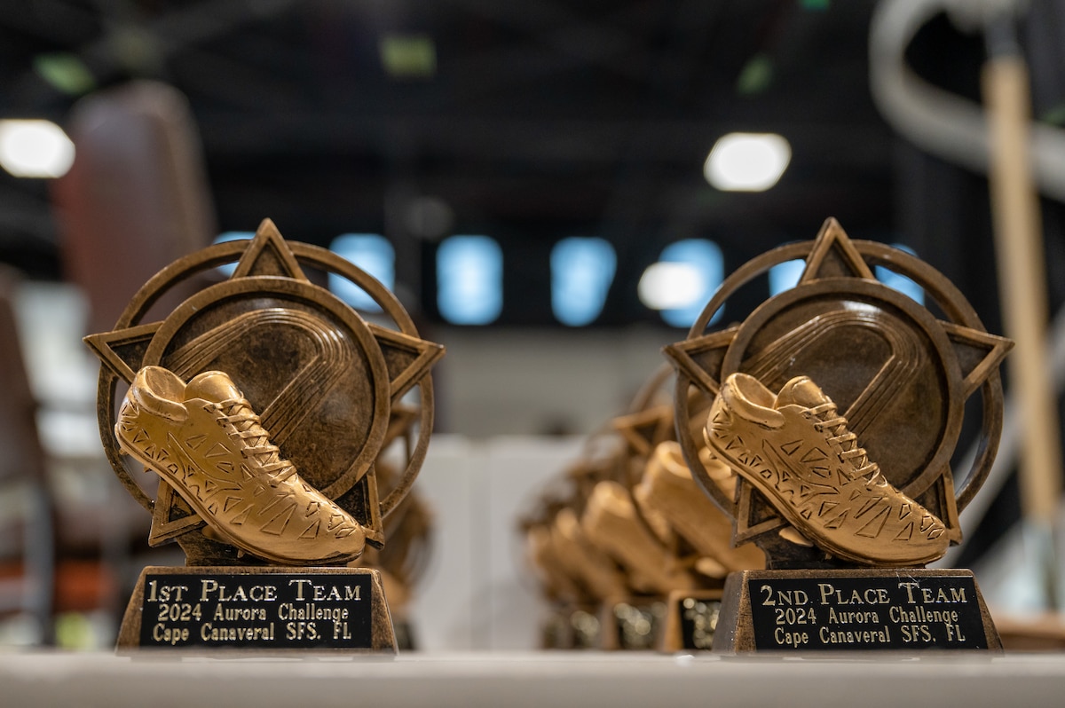 Race trophies on a table.