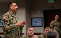 Air Force Gen. Steve Nordhaus, chief, National Guard Bureau, addresses nearly nearly 30 officers at the O-6 level and above, from 50 states, three territories, and the District of Columbia, and active-duty components from across the country during the Dual Status Command Training Course, at the North American Aerospace Defense Command and U.S. Northern Command headquarters on Peterson Space Force Base, Colo., Dec. 13, 2024.