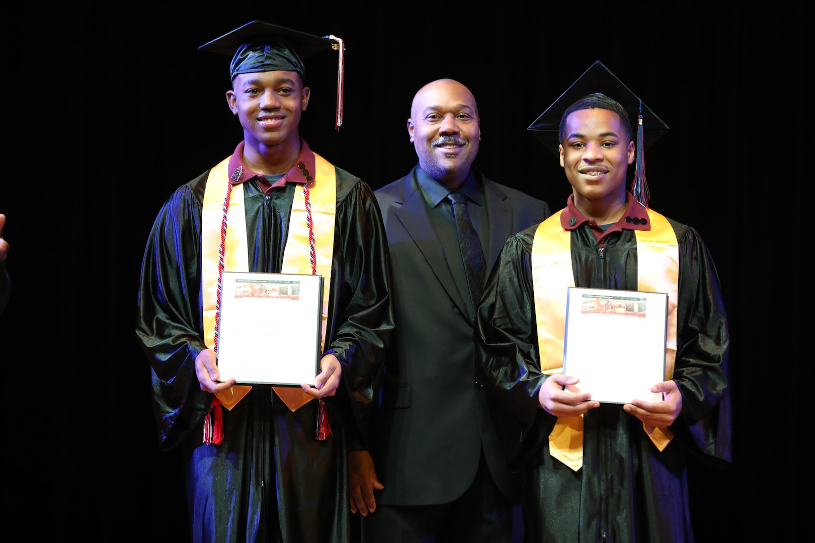 Cadets of the Capital Guardian Youth Challenge Academy Class 63 receive their diplomas upon completion of a 22 week-long “quasi-military" course, during a residential phase commencement ceremony at the University of the District of Columbia, Dec.13, 2024. Since 2013, the mission of the program is to intervene in and reclaim the lives of at-risk youth, and produce program graduates with the values, skills, education, and self-discipline necessary to succeed as adults.