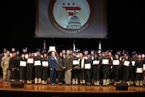 Cadets of the Capital Guardian Youth Challenge Academy Class 63 receive their diplomas upon completion of a 22 week-long “quasi-military" course, during a residential phase commencement ceremony at the University of the District of Columbia, Dec.13, 2024. Since 2013, the mission of the program is to intervene in and reclaim the lives of at-risk youth, and produce program graduates with the values, skills, education, and self-discipline necessary to succeed as adults.