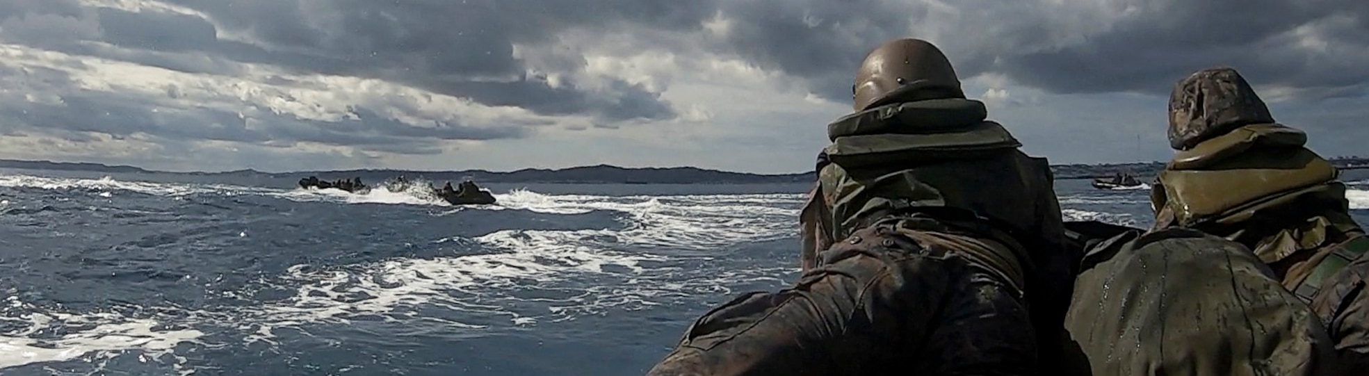 U.S. Marines with Battalion Landing Team 2/4, 31st Marine Expeditonary Unit, conduct boat formation drills with an enhanced combat rubber reconnaissance craft during a small boat sustainment training at Naval Base White Beach, Okinawa, Japan on Dec. 10, 2024.