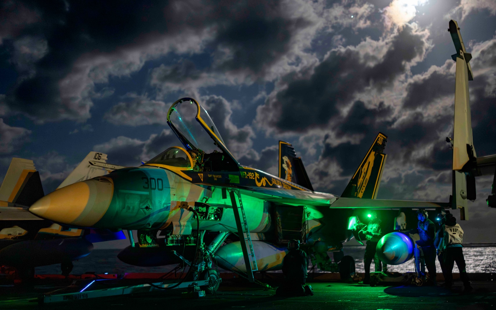 Sailors prepare an F/A-18E Super Hornet, assigned to the “Golden Dragons” of Strike Fighter Squadron (VFA) 192, for flight operations on the flight deck of the Nimitz-class aircraft carrier USS Carl Vinson (CVN 70), Dec. 15, 2024.